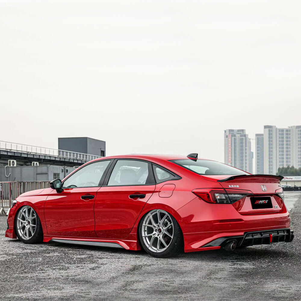 Anyone working on an aftermarket wing / spoiler option for the Si