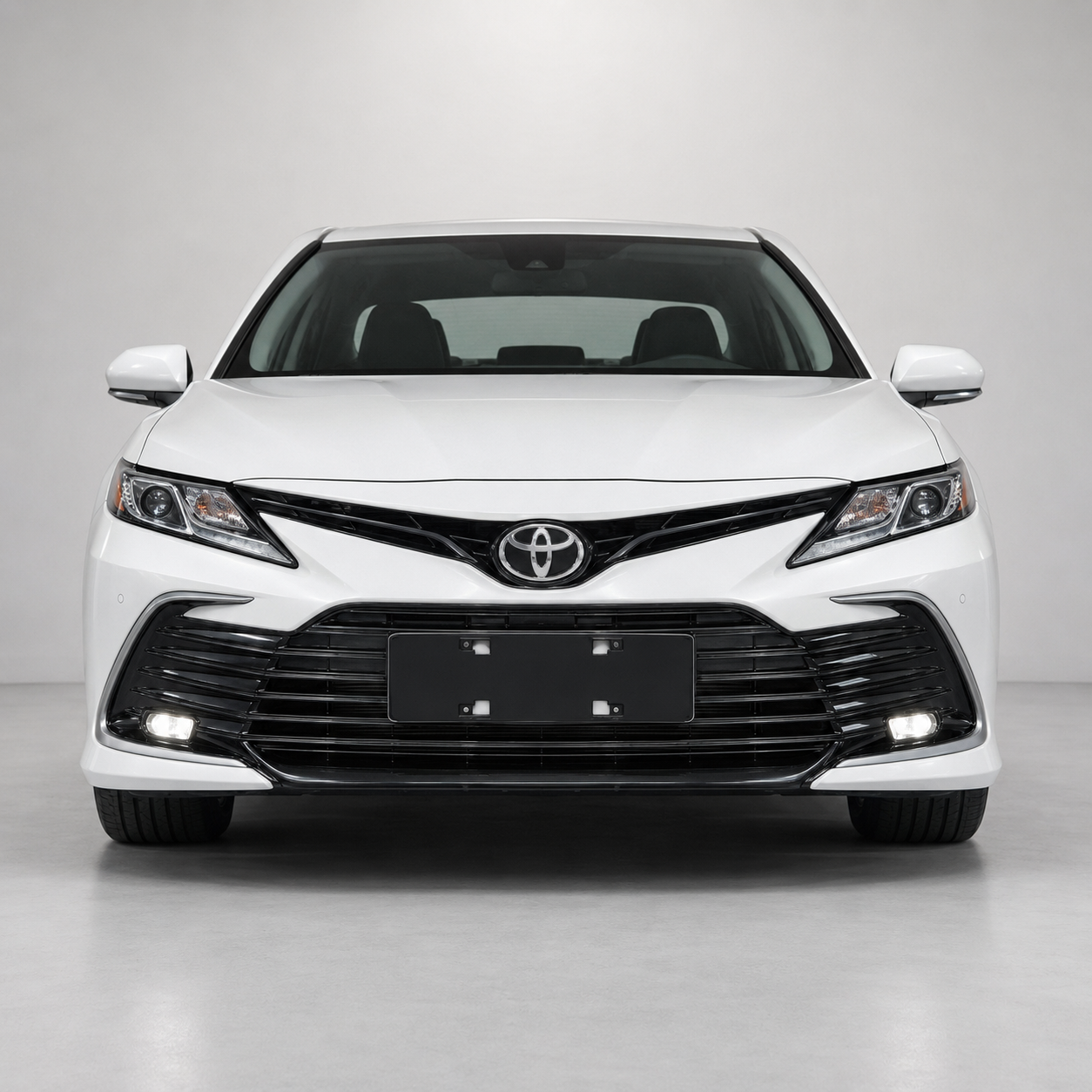 Straight front view of 2021-2024 Toyota Camry LE XLE grille and LED fog light kit