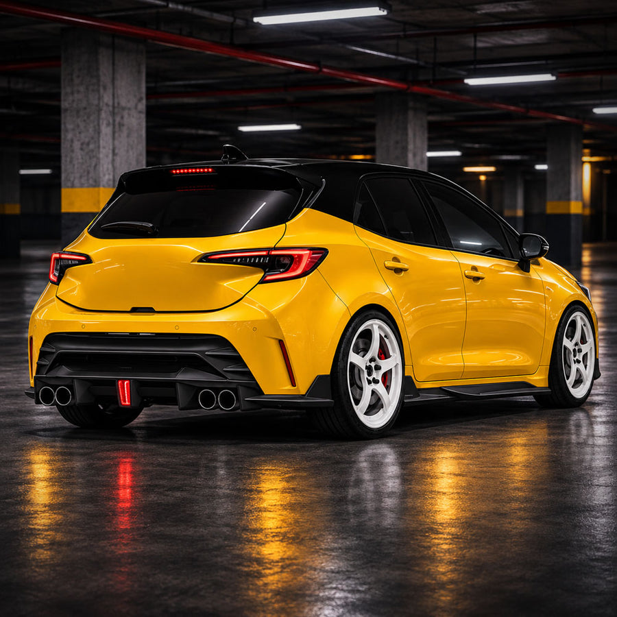YOFER rear diffuser installed on 2023–2026 Toyota Corolla Hatchback – rear exterior view